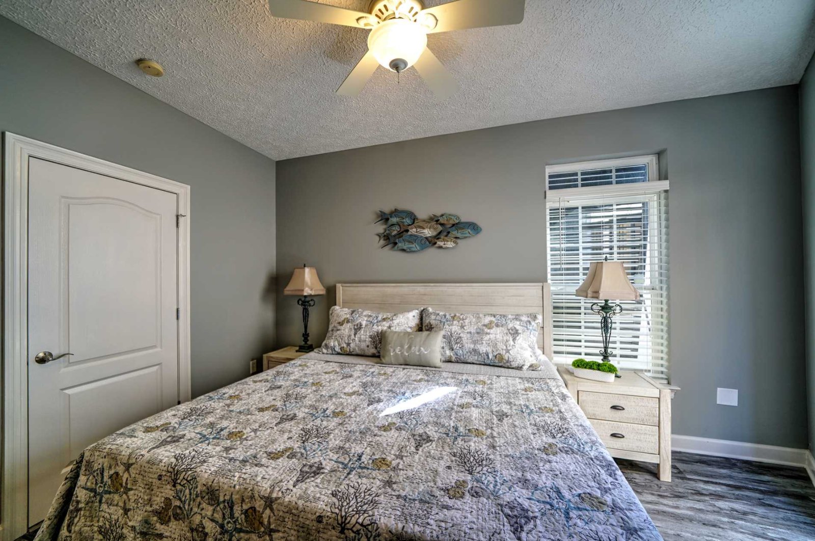 Guest king bedroom with coastal seashell bedding