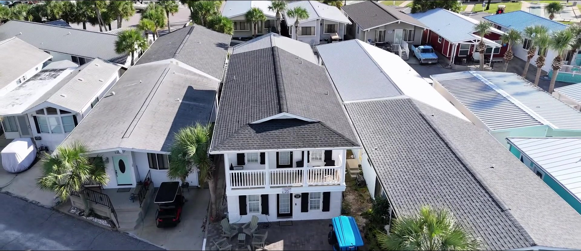 Facebook drone view of white-painted 25 Gulf Drive in Venture Out Resort